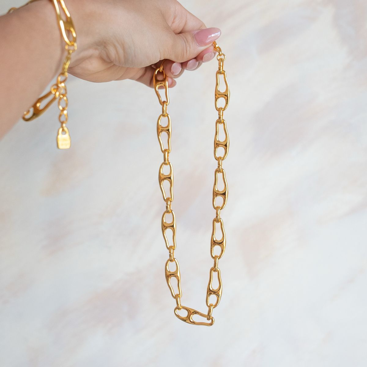 Collar Unode50 Chapa dorado