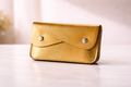 Billetera Poo Dorada - Bolso Paseo
