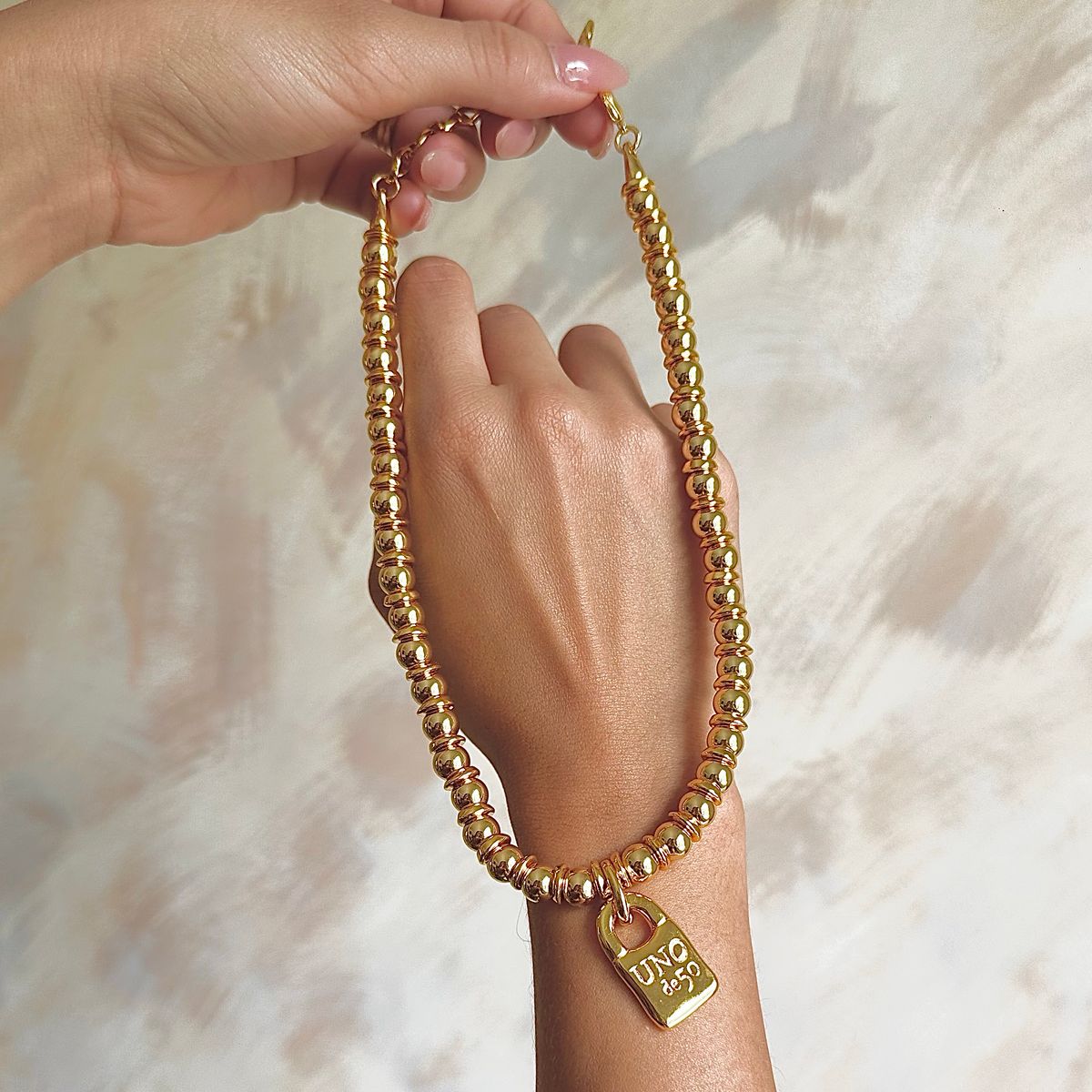 Collar Unode50 Candado dorado